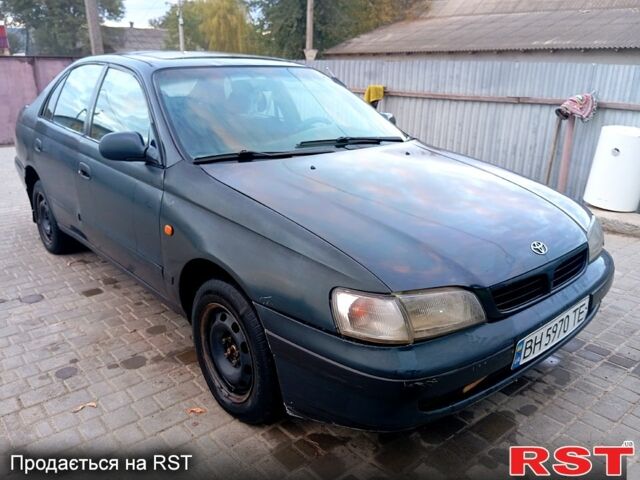 Синій Тойота Каріна, об'ємом двигуна 2 л та пробігом 200 тис. км за 1600 $, фото 1 на Automoto.ua