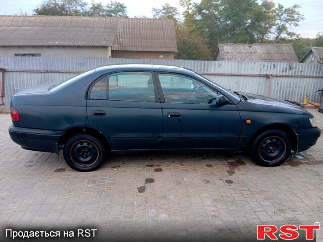 Синій Тойота Каріна, об'ємом двигуна 2 л та пробігом 200 тис. км за 1600 $, фото 7 на Automoto.ua