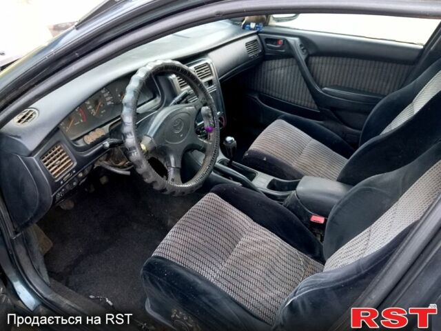 Синій Тойота Каріна, об'ємом двигуна 2 л та пробігом 200 тис. км за 1600 $, фото 10 на Automoto.ua