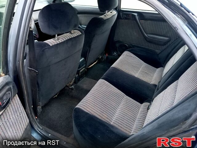 Синій Тойота Каріна, об'ємом двигуна 2 л та пробігом 200 тис. км за 1600 $, фото 12 на Automoto.ua