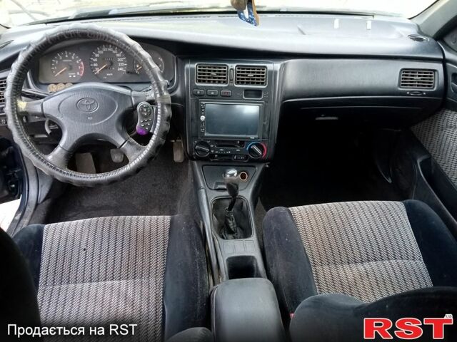 Синій Тойота Каріна, об'ємом двигуна 2 л та пробігом 200 тис. км за 1600 $, фото 9 на Automoto.ua