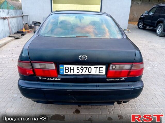 Синій Тойота Каріна, об'ємом двигуна 2 л та пробігом 200 тис. км за 1600 $, фото 3 на Automoto.ua