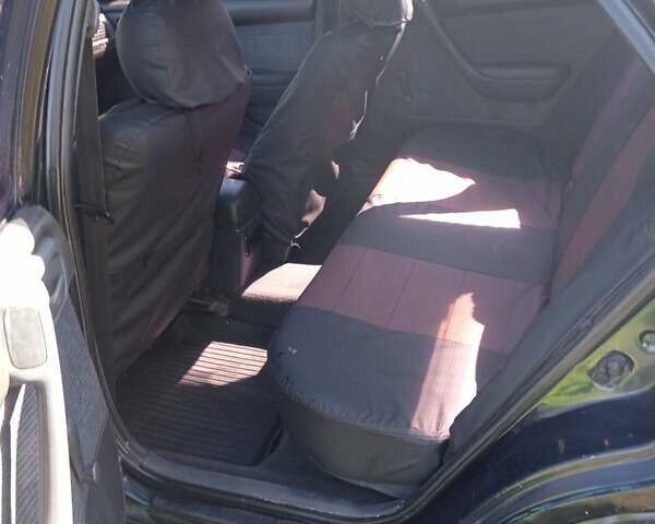 Синій Тойота Каріна, об'ємом двигуна 1.59 л та пробігом 487 тис. км за 2500 $, фото 1 на Automoto.ua