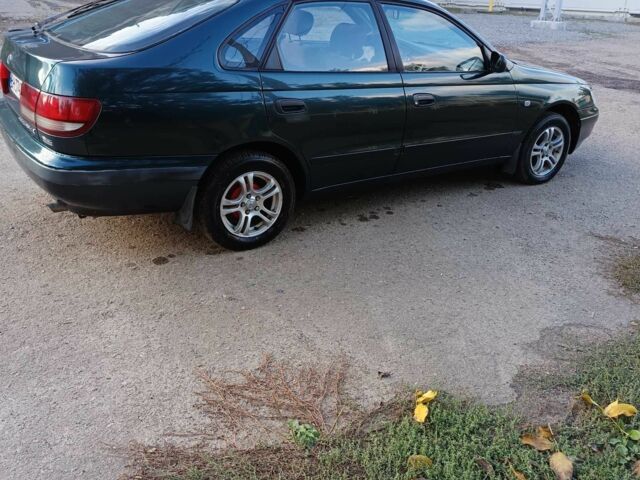 Зеленый Тойота Карина, объемом двигателя 1.6 л и пробегом 342 тыс. км за 3200 $, фото 6 на Automoto.ua