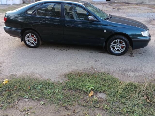 Зеленый Тойота Карина, объемом двигателя 1.6 л и пробегом 342 тыс. км за 3200 $, фото 5 на Automoto.ua