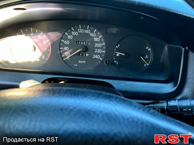 Зеленый Тойота Карина, объемом двигателя 2 л и пробегом 417 тыс. км за 2000 $, фото 5 на Automoto.ua