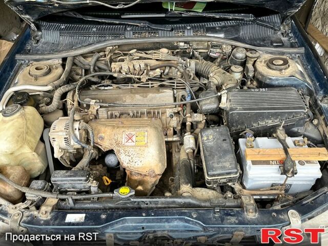 Зеленый Тойота Карина, объемом двигателя 2 л и пробегом 417 тыс. км за 2000 $, фото 4 на Automoto.ua