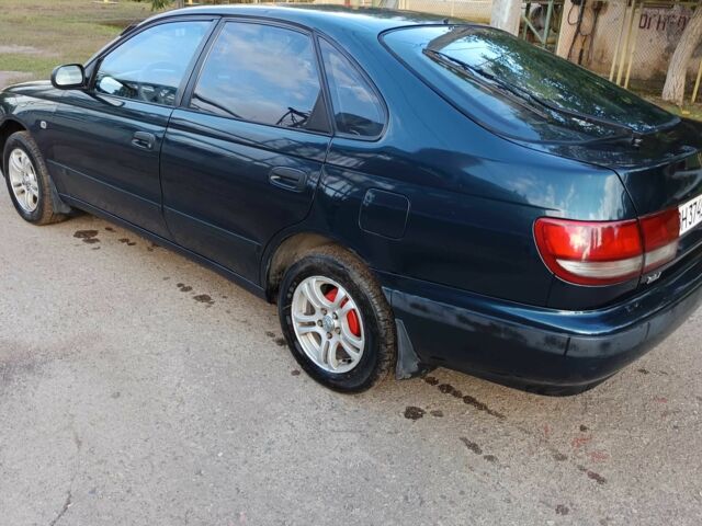 Зеленый Тойота Карина, объемом двигателя 1.6 л и пробегом 342 тыс. км за 3200 $, фото 2 на Automoto.ua