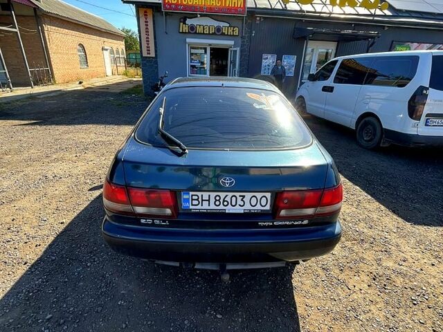 Зеленый Тойота Карина, объемом двигателя 2 л и пробегом 417 тыс. км за 2000 $, фото 3 на Automoto.ua