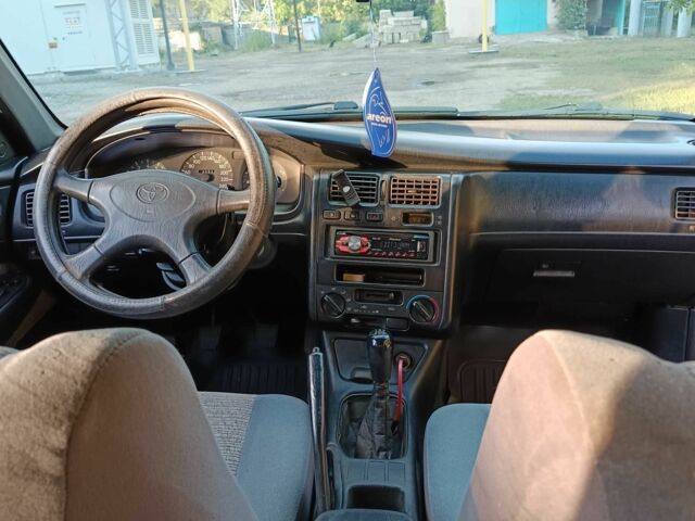 Зеленый Тойота Карина, объемом двигателя 1.6 л и пробегом 342 тыс. км за 3200 $, фото 14 на Automoto.ua