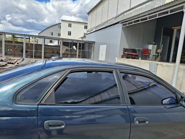 Зеленый Тойота Карина, объемом двигателя 2 л и пробегом 359 тыс. км за 2000 $, фото 2 на Automoto.ua