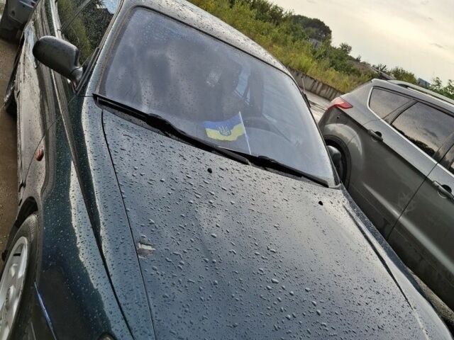 Зеленый Тойота Карина, объемом двигателя 2 л и пробегом 359 тыс. км за 2000 $, фото 5 на Automoto.ua