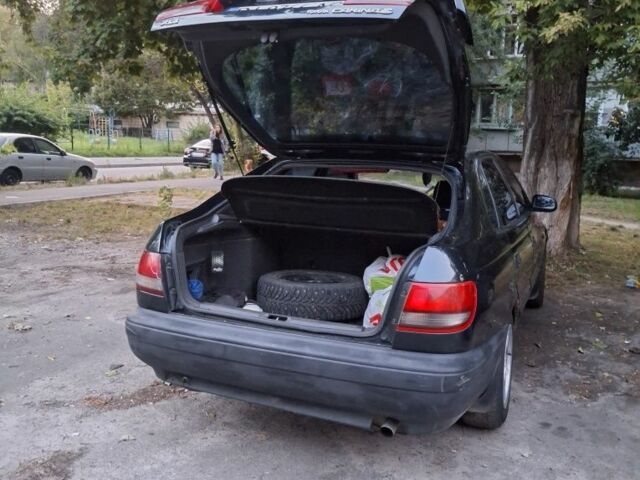 Зеленый Тойота Карина, объемом двигателя 2 л и пробегом 359 тыс. км за 2000 $, фото 3 на Automoto.ua