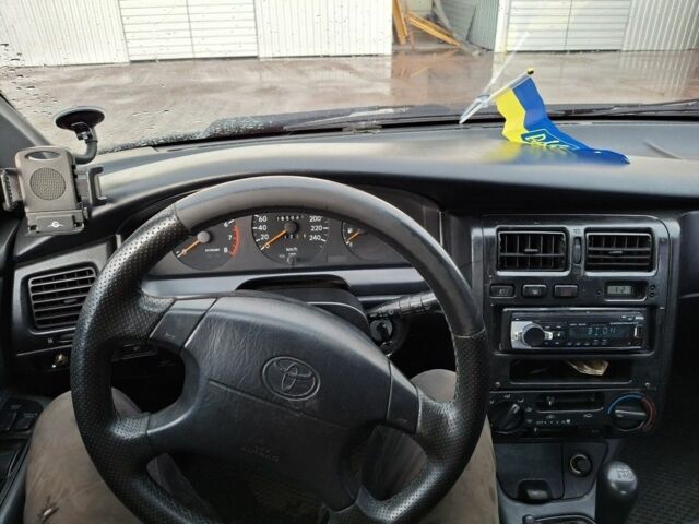 Зеленый Тойота Карина, объемом двигателя 2 л и пробегом 359 тыс. км за 2000 $, фото 6 на Automoto.ua