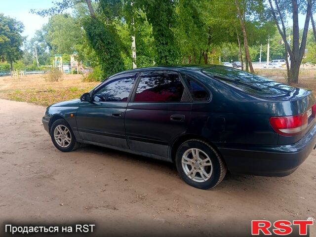 Зелений Тойота Каріна, об'ємом двигуна 1.6 л та пробігом 400 тис. км за 2000 $, фото 6 на Automoto.ua