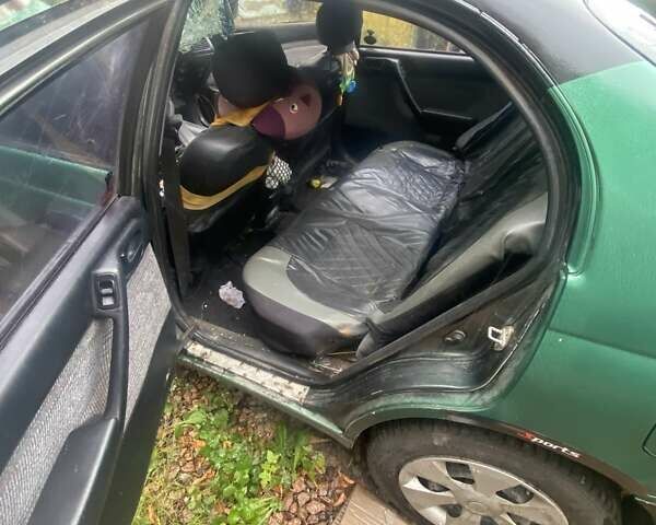 Зелений Тойота Каріна, об'ємом двигуна 1.56 л та пробігом 390 тис. км за 900 $, фото 4 на Automoto.ua