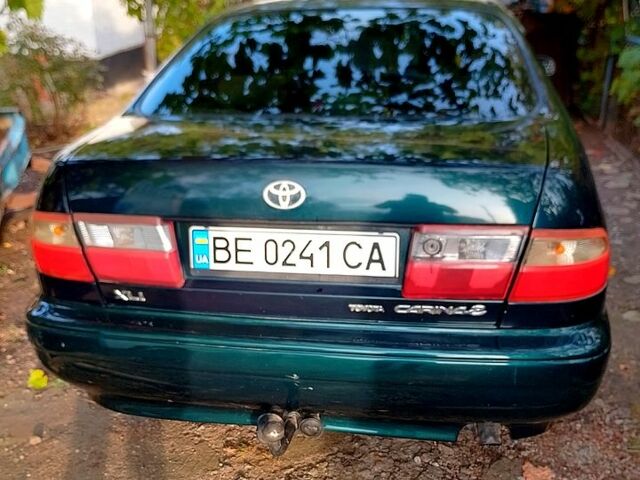Зелений Тойота Каріна, об'ємом двигуна 1.6 л та пробігом 438 тис. км за 2000 $, фото 3 на Automoto.ua