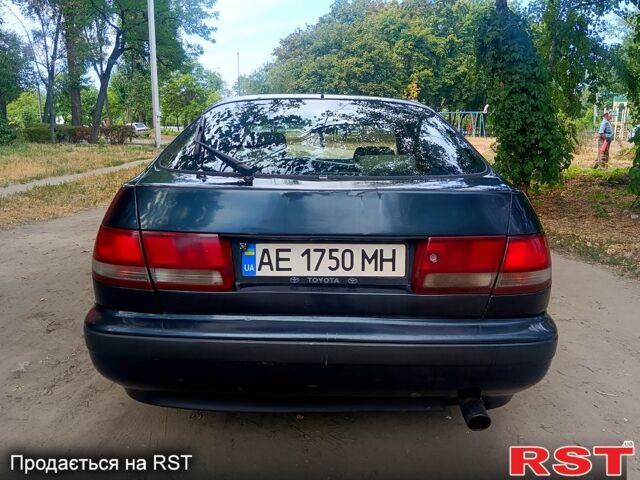 Зелений Тойота Каріна, об'ємом двигуна 1.6 л та пробігом 400 тис. км за 2000 $, фото 7 на Automoto.ua
