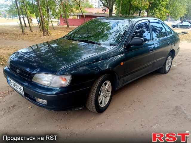 Зелений Тойота Каріна, об'ємом двигуна 1.6 л та пробігом 400 тис. км за 2000 $, фото 1 на Automoto.ua