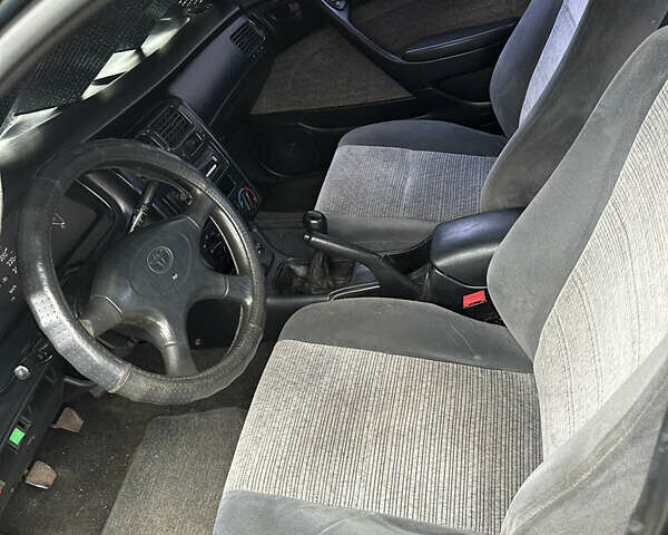 Зеленый Тойота Карина, объемом двигателя 2 л и пробегом 500 тыс. км за 1500 $, фото 3 на Automoto.ua