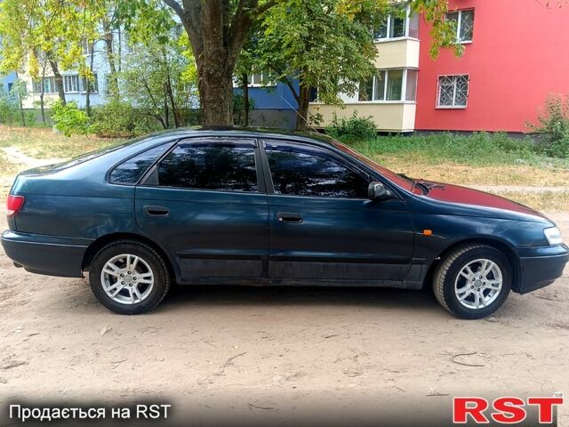 Зелений Тойота Каріна, об'ємом двигуна 1.6 л та пробігом 400 тис. км за 2000 $, фото 4 на Automoto.ua