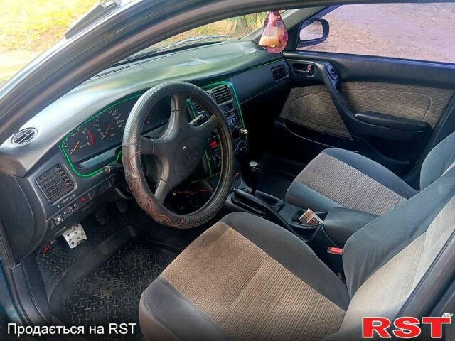 Зелений Тойота Каріна, об'ємом двигуна 1.6 л та пробігом 400 тис. км за 2000 $, фото 9 на Automoto.ua