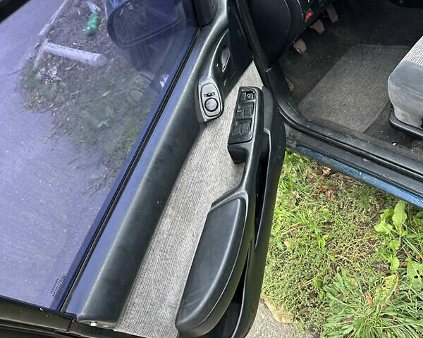 Зеленый Тойота Карина, объемом двигателя 2 л и пробегом 500 тыс. км за 1500 $, фото 4 на Automoto.ua