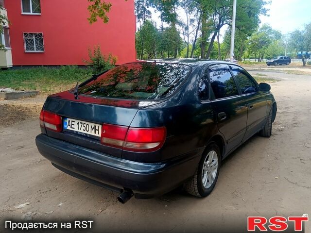 Зелений Тойота Каріна, об'ємом двигуна 1.6 л та пробігом 400 тис. км за 2000 $, фото 5 на Automoto.ua