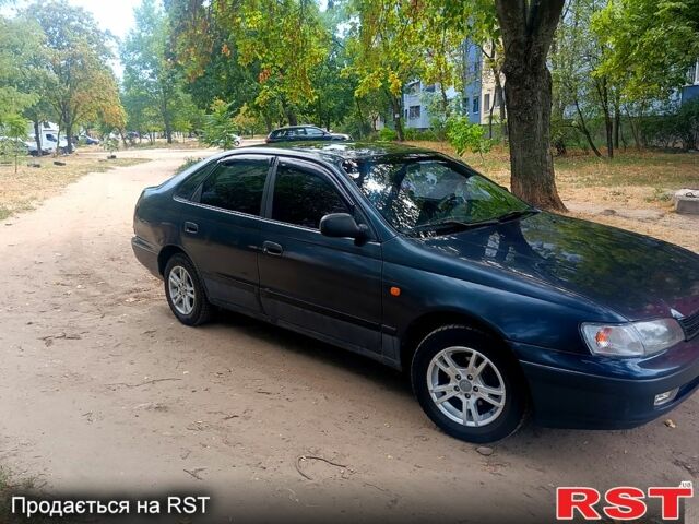 Зелений Тойота Каріна, об'ємом двигуна 1.6 л та пробігом 400 тис. км за 2000 $, фото 3 на Automoto.ua