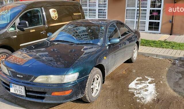 Зеленый Тойота Карина, объемом двигателя 2 л и пробегом 450 тыс. км за 3500 $, фото 4 на Automoto.ua