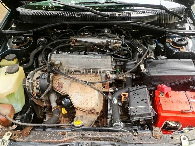 Зеленый Тойота Карина, объемом двигателя 2 л и пробегом 525 тыс. км за 2400 $, фото 4 на Automoto.ua