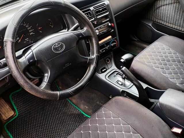 Зеленый Тойота Карина, объемом двигателя 2 л и пробегом 525 тыс. км за 2400 $, фото 8 на Automoto.ua