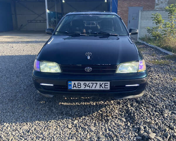 Зелений Тойота Каріна, об'ємом двигуна 1.76 л та пробігом 372 тис. км за 2150 $, фото 2 на Automoto.ua