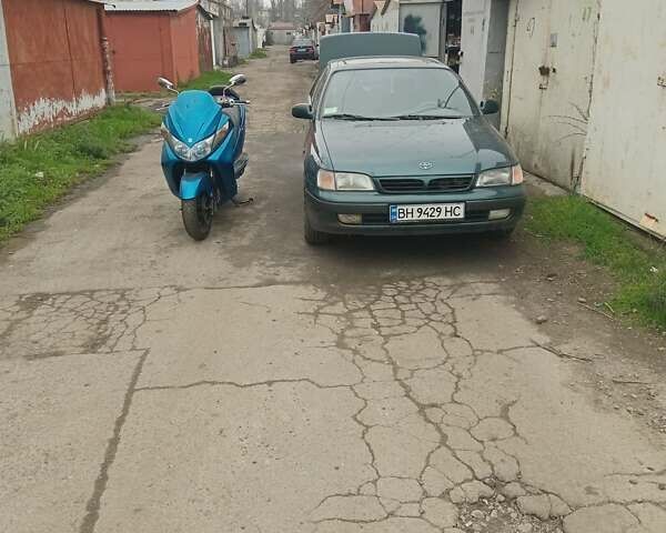 Зелений Тойота Каріна, об'ємом двигуна 1.76 л та пробігом 345 тис. км за 3500 $, фото 2 на Automoto.ua