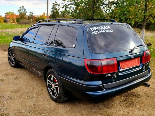 Зеленый Тойота Карина, объемом двигателя 2 л и пробегом 380 тыс. км за 3700 $, фото 5 на Automoto.ua