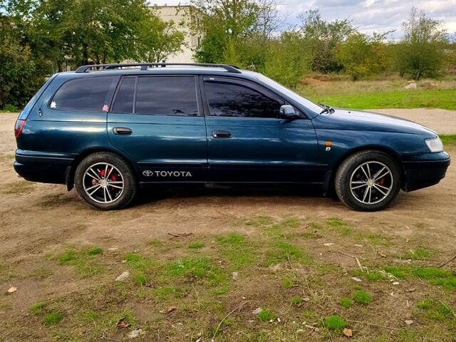 Зеленый Тойота Карина, объемом двигателя 2 л и пробегом 380 тыс. км за 3700 $, фото 3 на Automoto.ua