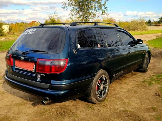 Зеленый Тойота Карина, объемом двигателя 2 л и пробегом 380 тыс. км за 3700 $, фото 7 на Automoto.ua