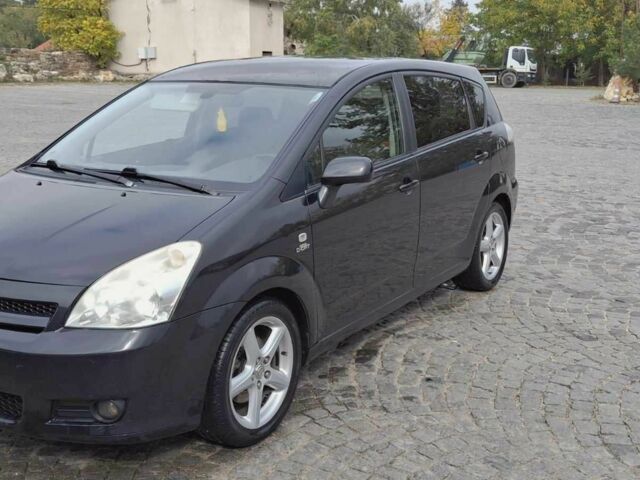 Черный Тойота Королла Версо, объемом двигателя 2.2 л и пробегом 300 тыс. км за 3300 $, фото 1 на Automoto.ua