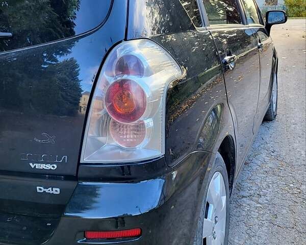 Черный Тойота Королла Версо, объемом двигателя 2.23 л и пробегом 328 тыс. км за 4100 $, фото 10 на Automoto.ua