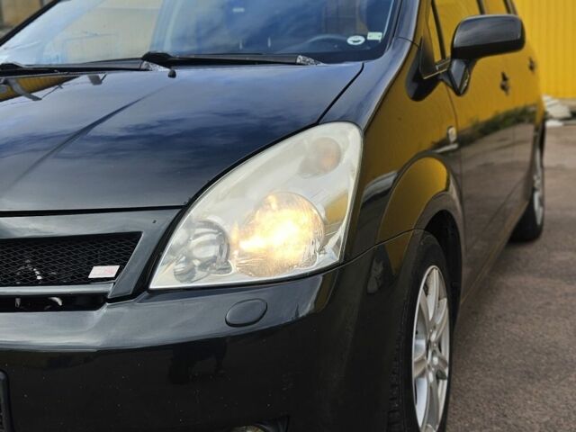 Черный Тойота Королла Версо, объемом двигателя 2 л и пробегом 373 тыс. км за 2957 $, фото 9 на Automoto.ua