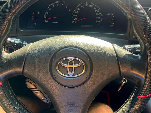 Серый Тойота Королла Версо, объемом двигателя 1.8 л и пробегом 324 тыс. км за 4600 $, фото 1 на Automoto.ua