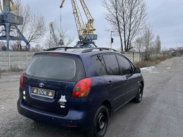Синій Тойота Королла Версо, об'ємом двигуна 2 л та пробігом 235 тис. км за 1550 $, фото 2 на Automoto.ua