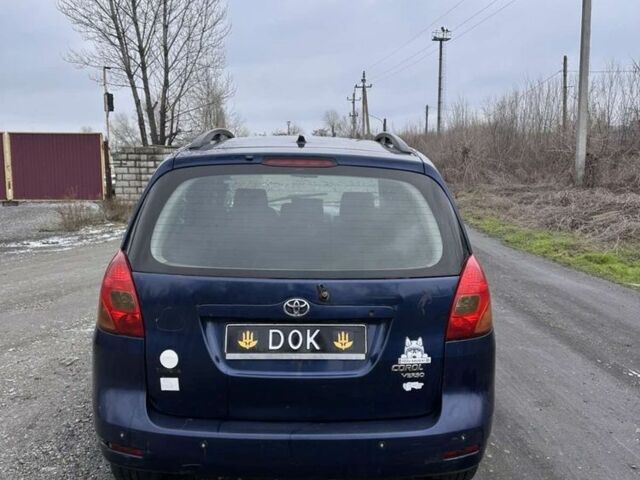 Синій Тойота Королла Версо, об'ємом двигуна 2 л та пробігом 235 тис. км за 1550 $, фото 3 на Automoto.ua