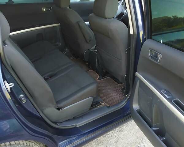 Синій Тойота Королла Версо, об'ємом двигуна 2 л та пробігом 396 тис. км за 5000 $, фото 6 на Automoto.ua
