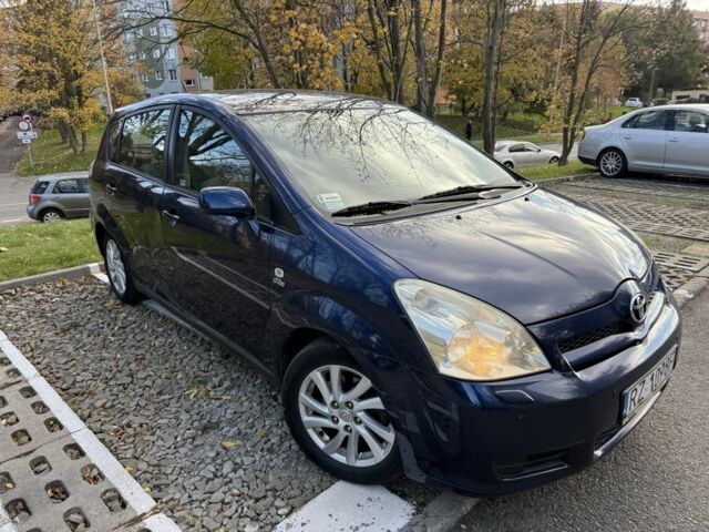 Синий Тойота Королла Версо, объемом двигателя 2 л и пробегом 283 тыс. км за 2400 $, фото 1 на Automoto.ua