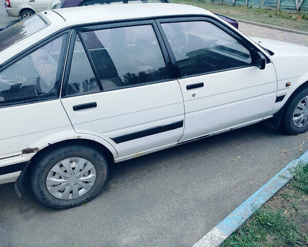 Белый Тойота Королла, объемом двигателя 1.3 л и пробегом 300 тыс. км за 1300 $, фото 16 на Automoto.ua