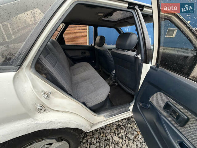 Білий Тойота Королла, об'ємом двигуна 1.3 л та пробігом 300 тис. км за 1300 $, фото 16 на Automoto.ua