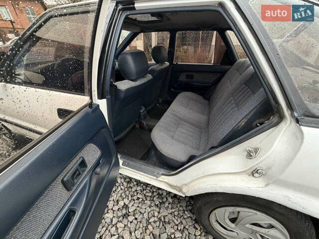 Білий Тойота Королла, об'ємом двигуна 1.3 л та пробігом 300 тис. км за 1300 $, фото 13 на Automoto.ua