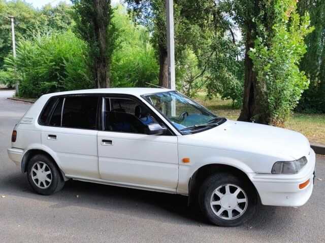 Білий Тойота Королла, об'ємом двигуна 1.3 л та пробігом 214 тис. км за 1400 $, фото 4 на Automoto.ua