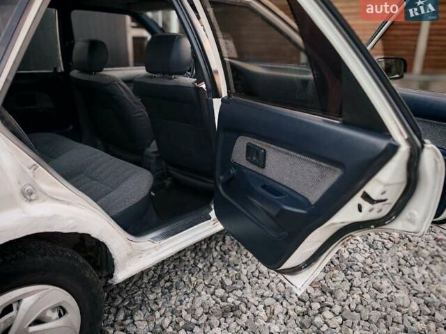 Белый Тойота Королла, объемом двигателя 1.3 л и пробегом 270 тыс. км за 1300 $, фото 10 на Automoto.ua